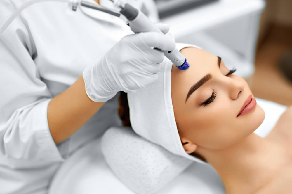 Woman Getting Facial Hydro Microdermabrasion